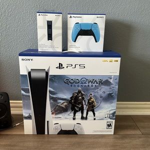 New ps5 God of war bundle. 1 extra controller and holder.